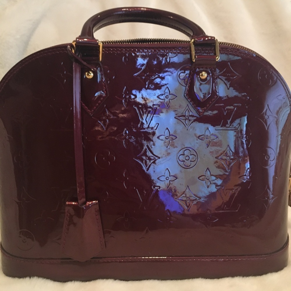 Louis Vuitton Alma pm rouge fauviste. Excellent